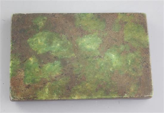 A Chinese green hardstone rectangular brushwasher, 9cm, carved wood stand